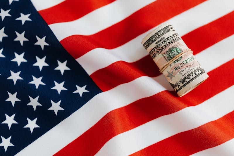American flag and dollar bills